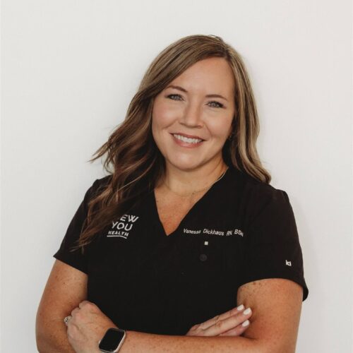 Vanessa Dickhaus, RN at New You Health, smiling in front of a white wall in a professional headshot.