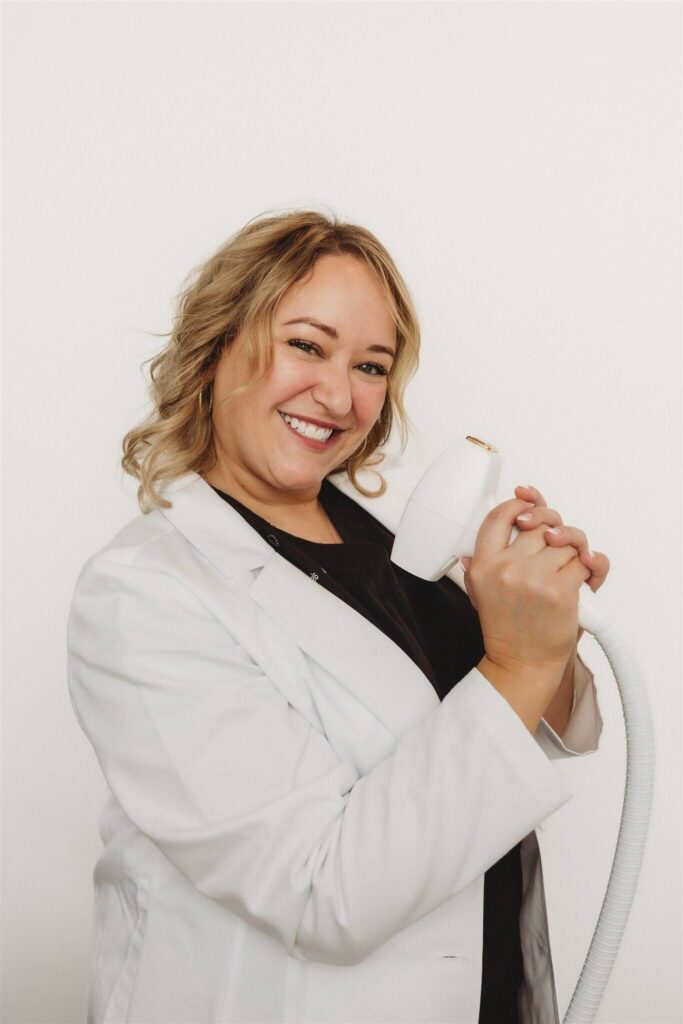 Deborah Daniels, , ANP-BC, APRN-FPA holds a laser used to remove hair for aesthetic treatment at New You Health in Peoria, IL