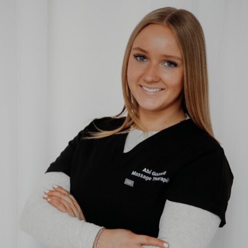 Professional headshot of licensed massage therapist at New You Health in Peoria, Illinois, specializing in therapeutic massage, deep tissue massage, Swedish massage, and muscle recovery treatments. Experienced massage therapist providing relaxation massage, pain relief therapy, and wellness-focused bodywork at New You Health medical spa in Peoria IL. Friendly, professional massage therapist dedicated to helping clients reduce stress, relieve muscle tension, and support overall health and wellness through customized massage therapy services.